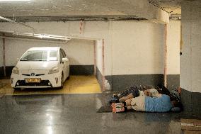 Israelis Shelter Underground Parking Lot - Tel Aviv