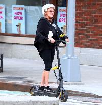 Deborra-Lee Furness Riding Her Scooter - NYC