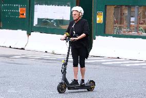Deborra-Lee Furness Riding Her Scooter - NYC