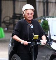 Deborra-Lee Furness Riding Her Scooter - NYC