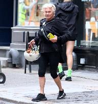 Deborra-Lee Furness Riding Her Scooter - NYC