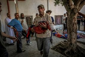 Palestinians Mourn Airstrike Victims at Al-Shifa Hospital - Gaza