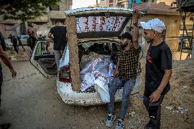 Palestinians Mourn Airstrike Victims at Al-Shifa Hospital - Gaza