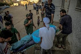 Palestinians Mourn Airstrike Victims at Al-Shifa Hospital - Gaza