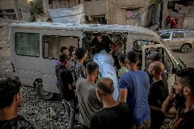 Palestinians Mourn Airstrike Victims at Al-Shifa Hospital - Gaza