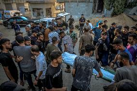 Palestinians Mourn Airstrike Victims at Al-Shifa Hospital - Gaza