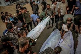 Palestinians Mourn Airstrike Victims at Al-Shifa Hospital - Gaza