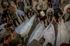 Palestinians Mourn Airstrike Victims at Al-Shifa Hospital - Gaza