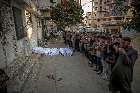 Palestinians Mourn Airstrike Victims at Al-Shifa Hospital - Gaza