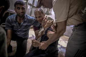 Palestinians Mourn Airstrike Victims at Al-Shifa Hospital - Gaza