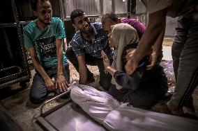 Palestinians Mourn Airstrike Victims at Al-Shifa Hospital - Gaza