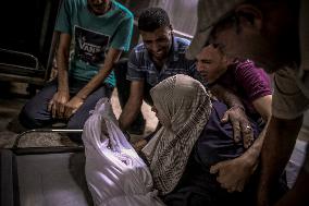 Palestinians Mourn Airstrike Victims at Al-Shifa Hospital - Gaza