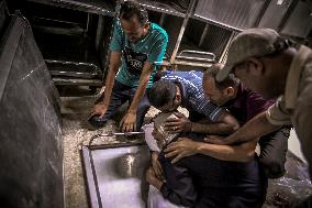 Palestinians Mourn Airstrike Victims at Al-Shifa Hospital - Gaza