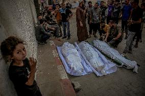Palestinians Mourn Airstrike Victims at Al-Shifa Hospital - Gaza