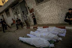 Palestinians Mourn Airstrike Victims at Al-Shifa Hospital - Gaza