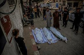 Palestinians Mourn Airstrike Victims at Al-Shifa Hospital - Gaza