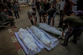 Palestinians Mourn Airstrike Victims at Al-Shifa Hospital - Gaza
