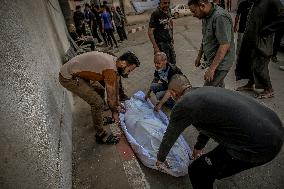 Palestinians Mourn Airstrike Victims at Al-Shifa Hospital - Gaza