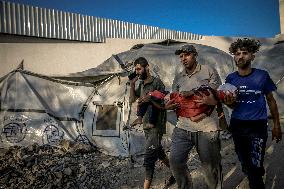Palestinians Mourn Airstrike Victims at Al-Shifa Hospital - Gaza