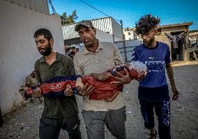 Palestinians Mourn Airstrike Victims at Al-Shifa Hospital - Gaza