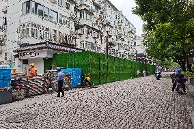 Rainstorm Damages Storefronts in Shanghai