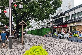 Rainstorm Damages Storefronts in Shanghai