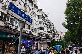 Rainstorm Damages Storefronts in Shanghai