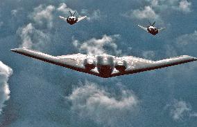 Northrop B-2 Spirit Bomber Followed by two Lockheed F-117 Nighthawks