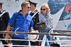 Lachlan Murdoch and Sarah Murdoch At Venice Airport