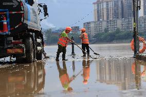 Clearing Silt After Flood in Rong'an
