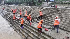Clearing Silt After Flood in Rong'an