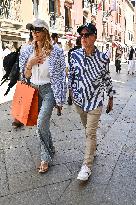 Tommy And Dee Hilfiger Walking In Venice Streets