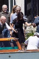 Bill Gates and friends leave St Regis Hotel in Venice