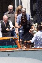 Bill Gates and friends leave St Regis Hotel in Venice