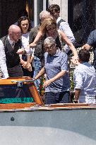 Bill Gates and friends leave St Regis Hotel in Venice