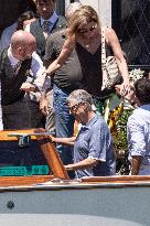 Bill Gates and friends leave St Regis Hotel in Venice