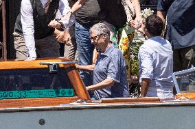 Bill Gates and friends leave St Regis Hotel in Venice