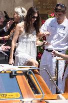 Vittoria Ceretti and Leonardo DiCaprio leave Gritti Hotel in Venice
