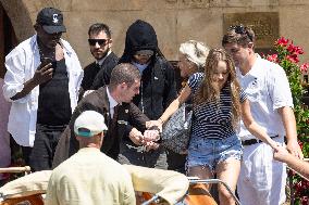 Vittoria Ceretti and Leonardo DiCaprio leave Gritti Hotel in Venice