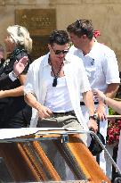 Orlando Blum leaves his hotel in Venice