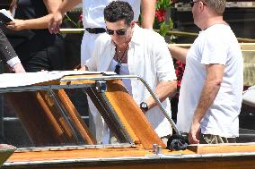 Orlando Blum leaves his hotel in Venice