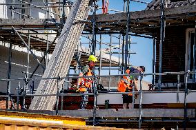 Construction Workers During The National Heat Plan - Gouda