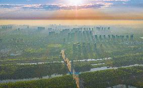 Buildings Under Morning Glow in Suqian