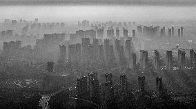 Buildings Under Morning Glow in Suqian