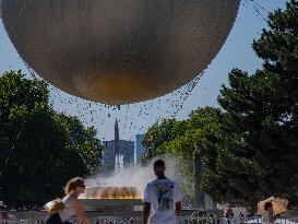 Olympic Flame Returns to Tuileries Garden in New Display - Paris