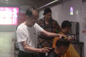Citizens Enjoy Coolness in The Air-raid Shelter in Hangzhou