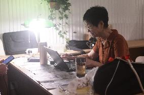 Citizens Enjoy Coolness in The Air-raid Shelter in Hangzhou