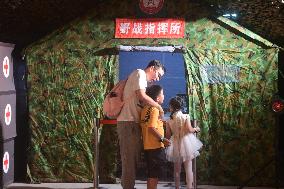 Citizens Enjoy Coolness in The Air-raid Shelter in Hangzhou