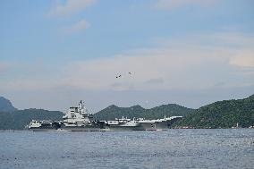 Aircraft Carrier Shandong Sailing In Hong Kong Waters