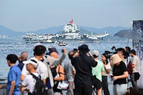 Aircraft Carrier Shandong Sailing In Hong Kong Waters